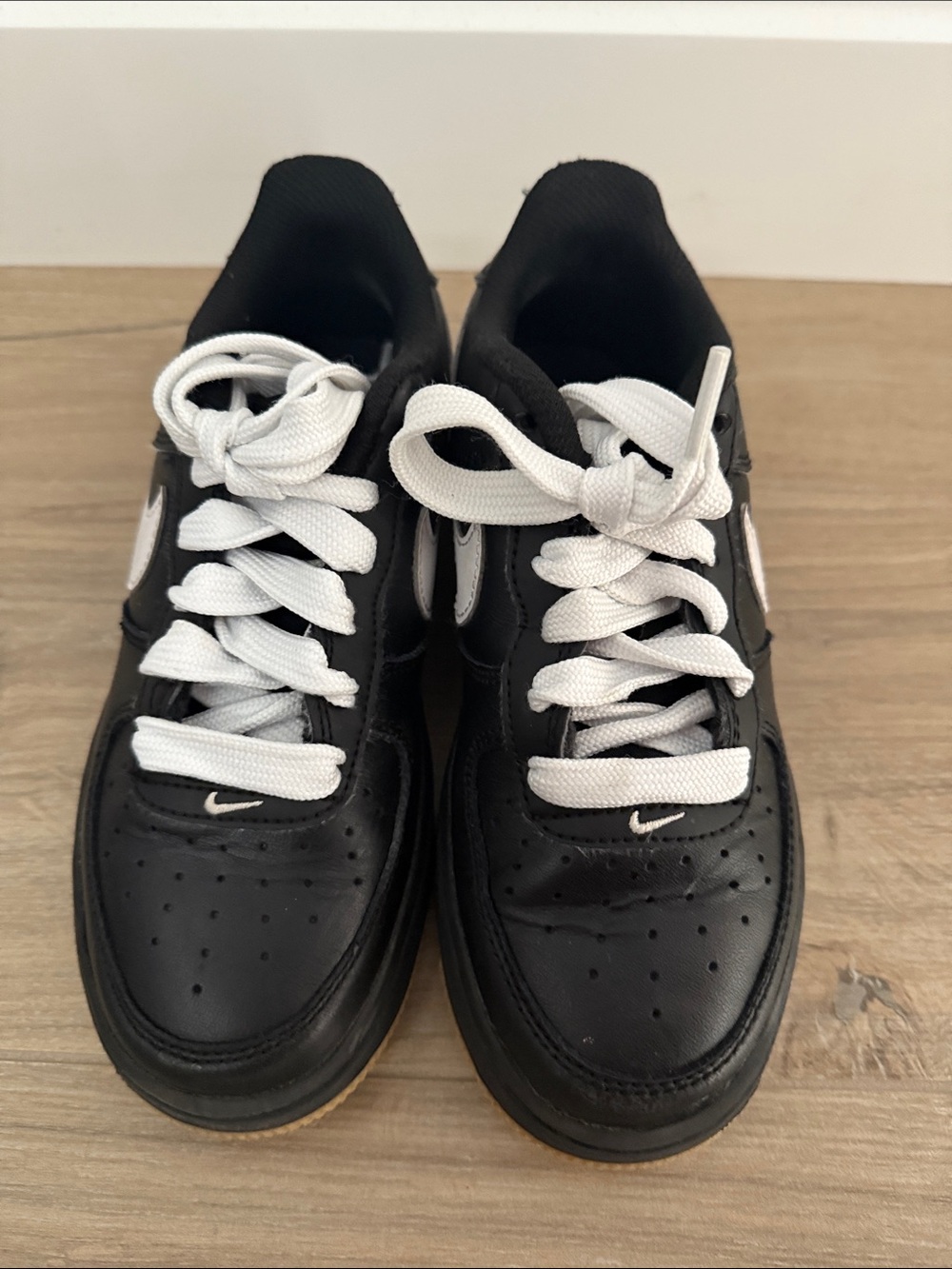 Nike Air Force1 Kids Black Leather Low-Top Sneakers with White Swoosh - Picture 3 of 6